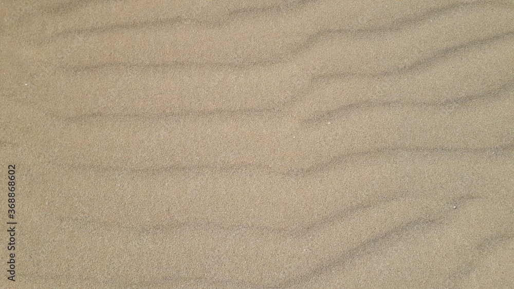 Wavy sand texture background. Flat lay. Top view Wavy sand texture background. Flat lay. Top view