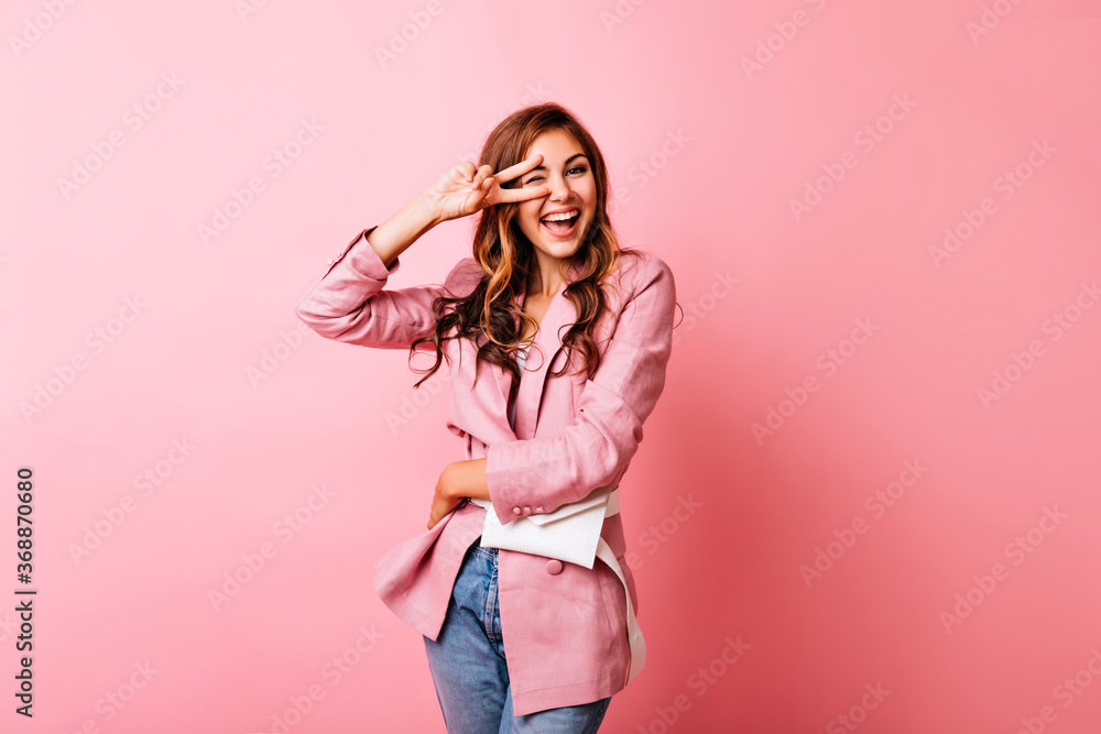 Wonderful european girl with red hair posing with peace sign. Appealing white lady in trendy jacket expressing positive emotions. Wonderful european girl with red hair posing with peace sign. Appealing white lady in trendy jacket expressing positive emotions.