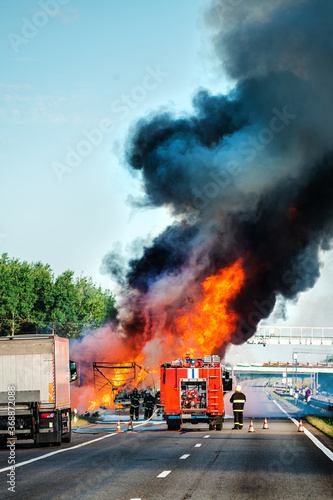 accident and fire on the road vertically
