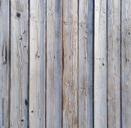 Background from gray boards. Wood texture, sea wind smoothed surface.