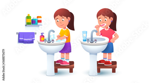 Kid girl washing hands and brushing teeth