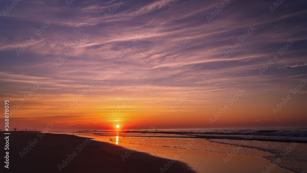 Summer Sunrise on the beach in Wildwood New Jersey Summer Sunrise on the beach in Wildwood New Jersey