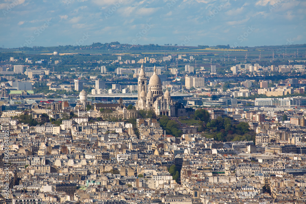 View of the Montmartre district of Paris including the Sacre-Coeur Basilica (The Basilica of the Sacred Heart). France