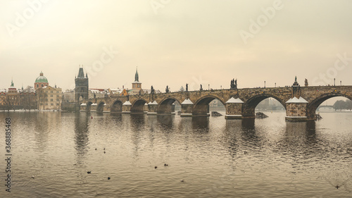 Charles Bridge over the Vltava River in Prague, Tourist Monument in Winter Time, Panorama of Medieval Gothic Structure