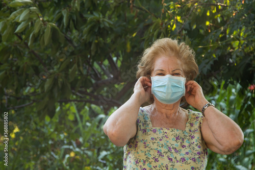 portrait of senior woman with face mask