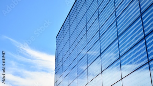 Wallpaper Mural Commercial building close up. Abstract texture of blue glass modern building. Business background. Torontodigital.ca