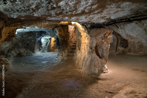 Derinkuyu cave underground city in Cappadocia, Multi-storey city is an ancient cave. Travel concept. photo