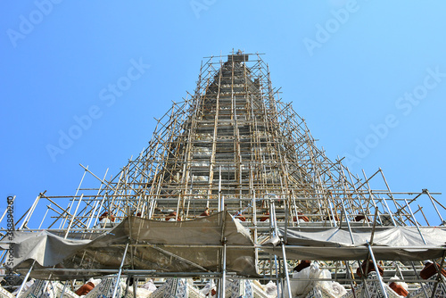 Wat Arun central tower in Bangkok, Thailand photo