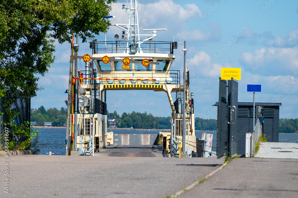 A closeup of a small municipal ferry connecting Katajannokka and Suomenlinna.