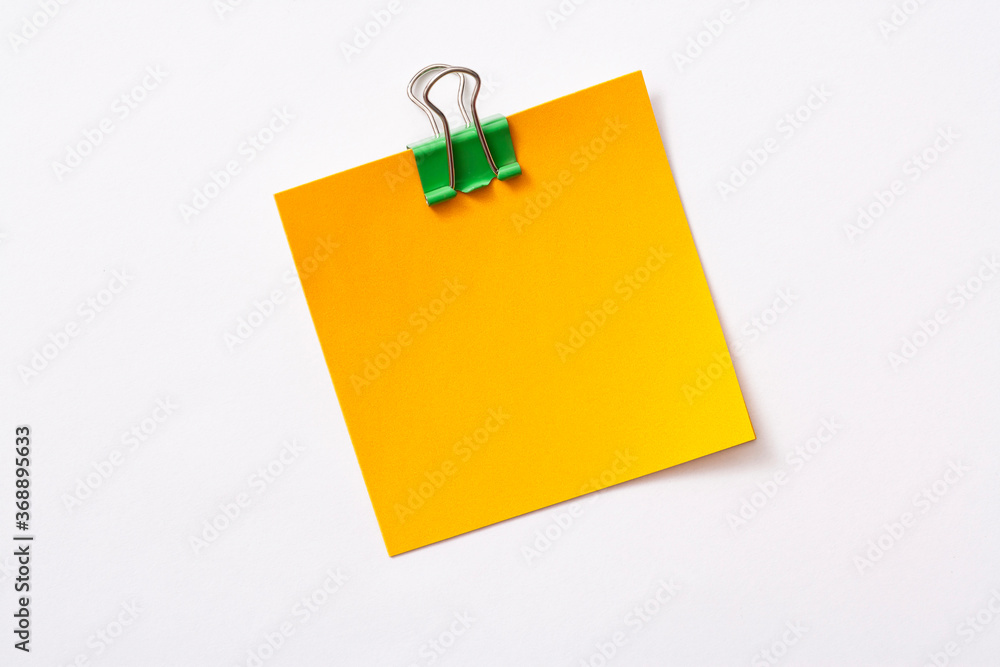 note paper and clip isolated on white background
note paper and clip isolated on white background