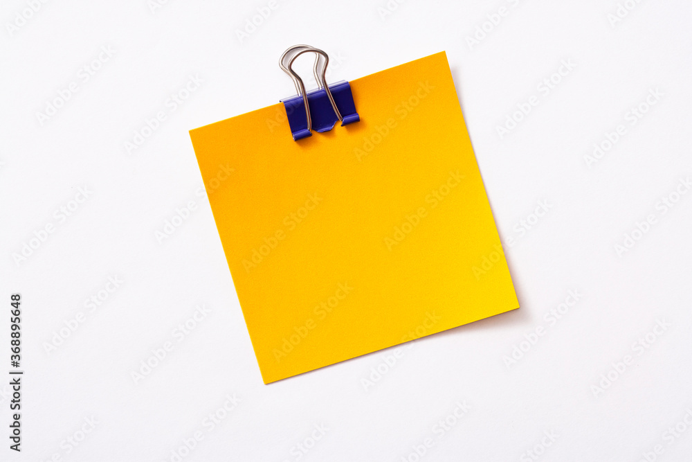 note paper and clip isolated on white background
note paper and clip isolated on white background