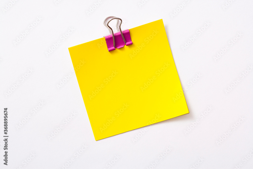 note paper and clip isolated on white background
note paper and clip isolated on white background