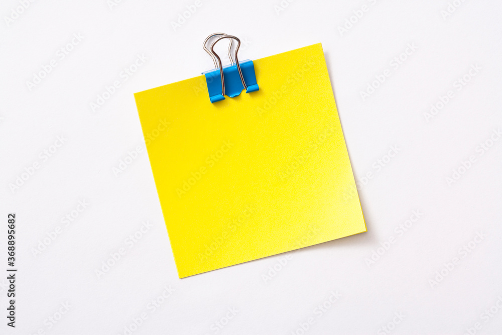 note paper and clip isolated on white background
note paper and clip isolated on white background