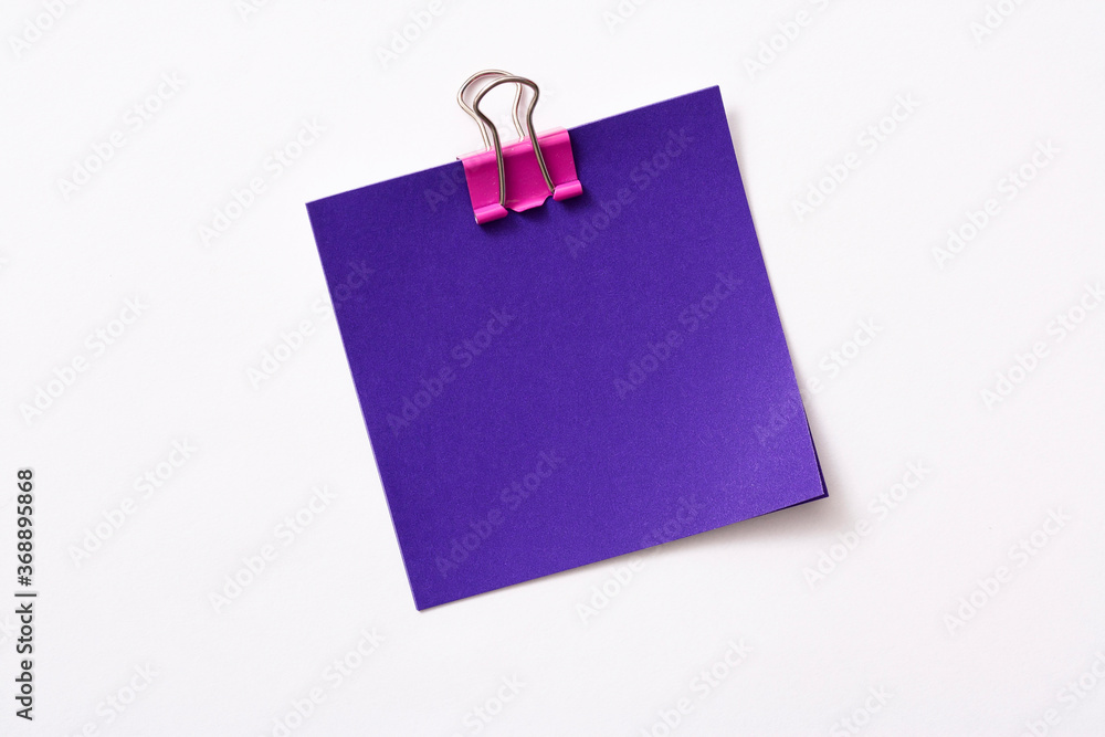 note paper and clip isolated on white background
note paper and clip isolated on white background