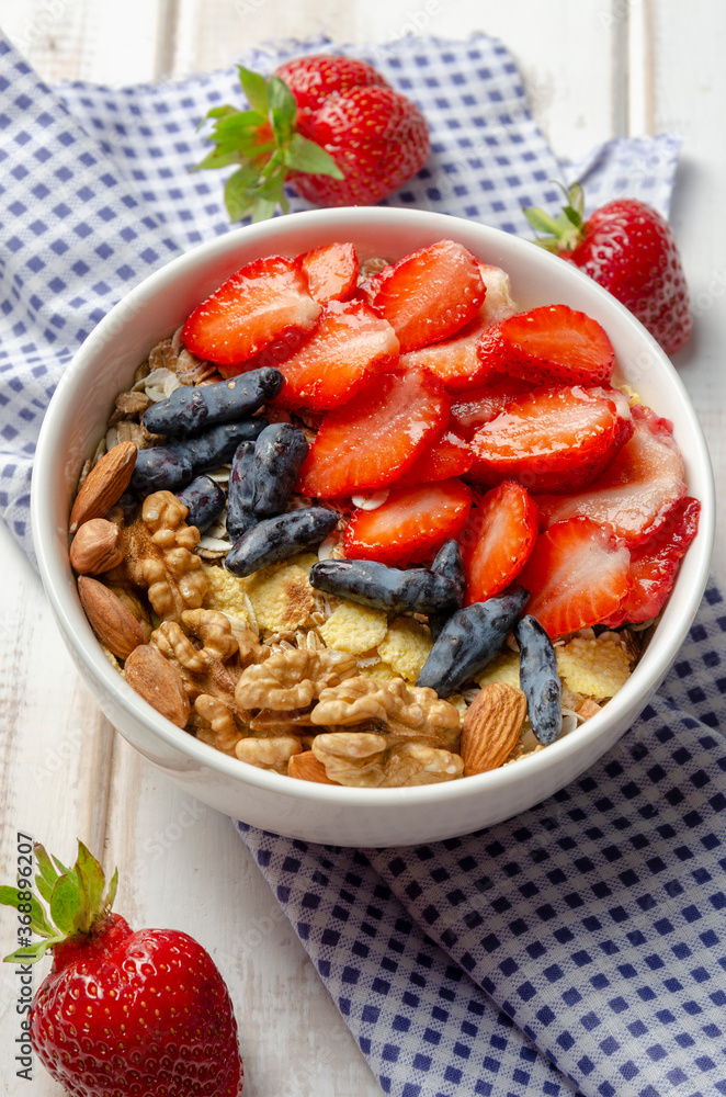 Homemade muesli bowl with strawberry, banana Homemade muesli bowl with strawberry, banana