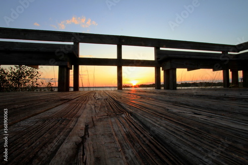 wooden bridge over the river © Alexander Cole