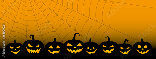 ハロウィーン、ジャック・オー・ランタンとクモの巣の不気味な背景