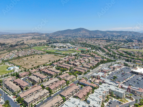 Aerial view of Torrey Santa Fe, middle class subdivision neighborhood with residential villas in San Diego County, California, USA. © Unwind