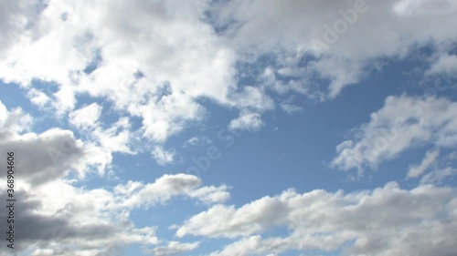 white clouds over the blue sky