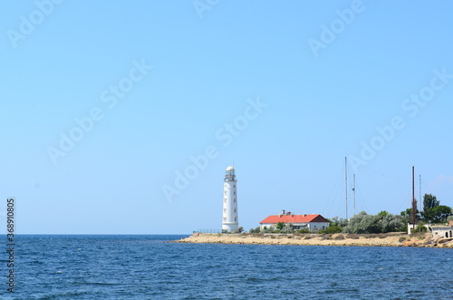 lighthouse in the sea © lex_geodez