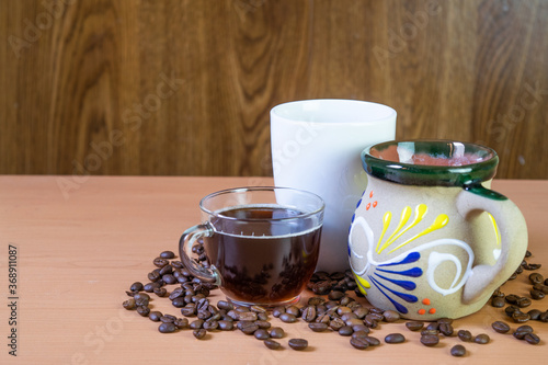 coffee cups with coffee beans on the table. with Copy space photo