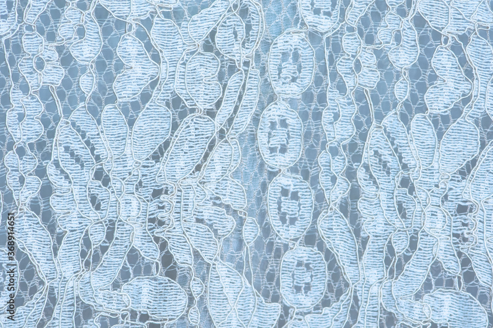 Fototapeta premium Lace fabric background, blue lace fabric