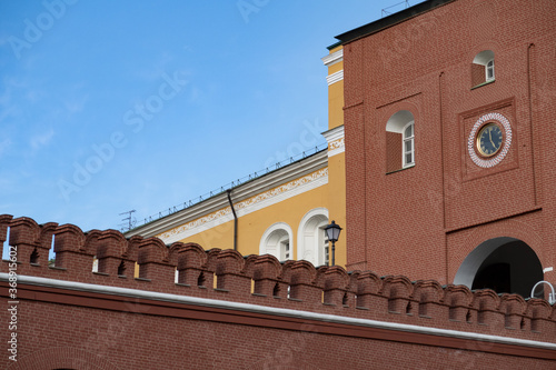 Entrance to the Moscow Kremlin from the side of the Trinity Tower, masonry, red brick, battlements, clock, arch photo