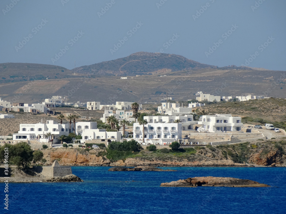 Panoramic view of traditional Greek white buildings on Paros island in Aegean Sea in Greece. Paros is one of famous Greek travel destinations for tourism and vacation.