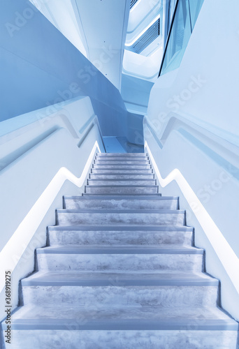 Interior view of futuristic stairway in modern architecture