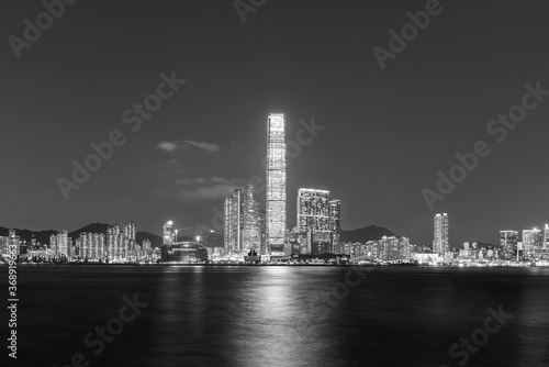 Skyline of Victoria harbor of Hong Kong city at night © leeyiutung