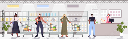 cutomers in protective masks in queue at cash desk keeping distance to prevent coronavirus social distancing concept groceries store interior horizontal full length vector illustration