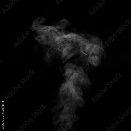 Fototapeta Naklejka Na Ścianę i Meble -  White smoke isolated on a black background. smoke image is like a ghost