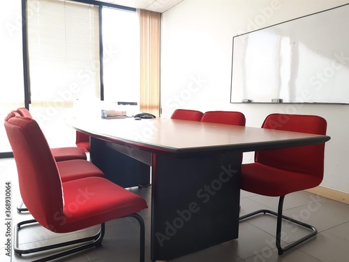 interior of a modern office and red chair