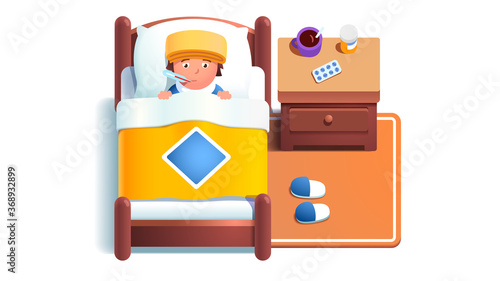 Sick boy kid lying in bed under blanket