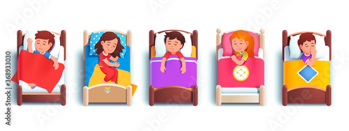 Boy and girls kids sleeping in kindergarten beds