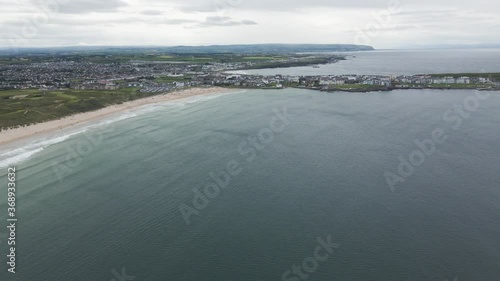 Calm tidal waters of Portrush Whiterocks beach Ireland aerial photo