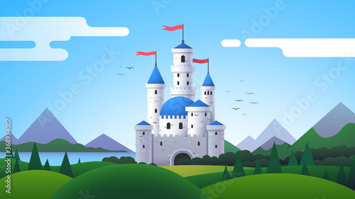 Fantasy landscape with castle, mountains and hills © iconicbestiary