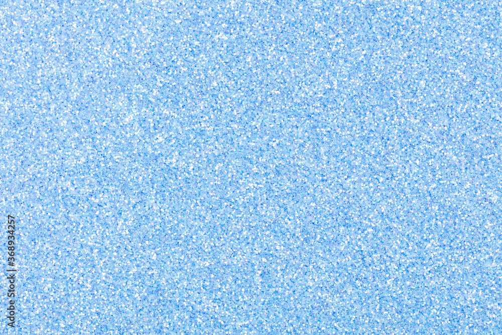 Glitter background for design view, texture in attractive light blue tone. Glitter background for design view, texture in attractive light blue tone.