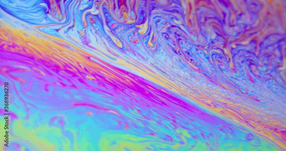 Surface of Liquid Soap with Changing Rainbow Colours. Macro. Surface of Liquid Soap with Changing Rainbow Colours. Macro.