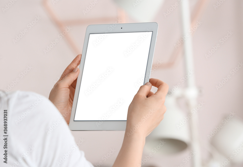 Woman with modern tablet computer at home Woman with modern tablet computer at home