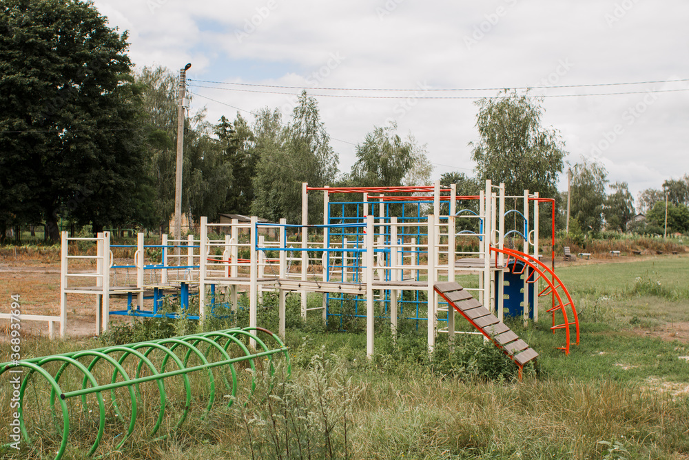 children's playground in park on a green meadow children's playground in park on a green meadow