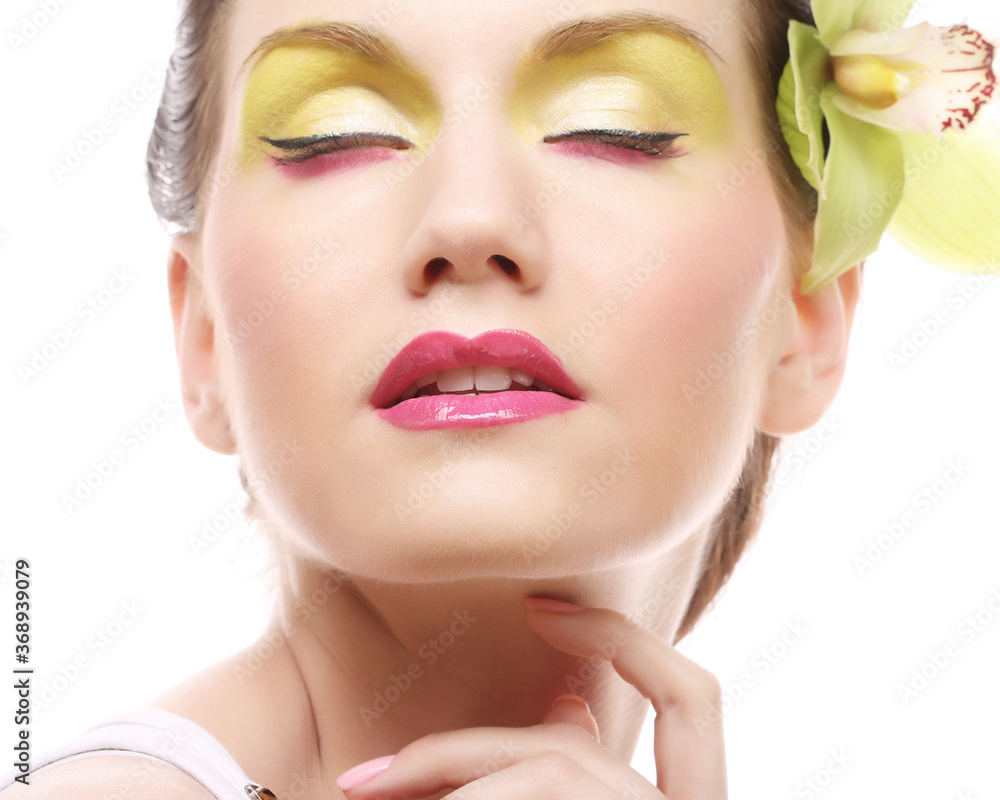 Beautiful stylish girl with orchid flower in hair. Beautiful stylish girl with orchid flower in hair.