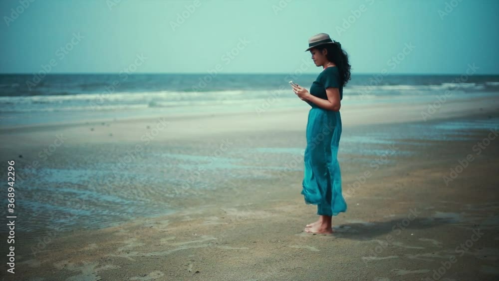Woman Holding Smartphone at Sea
.
Video of woman holding mobile phone at sea and using. Woman Holding Smartphone at Sea
.
Video of woman holding mobile phone at sea and using.