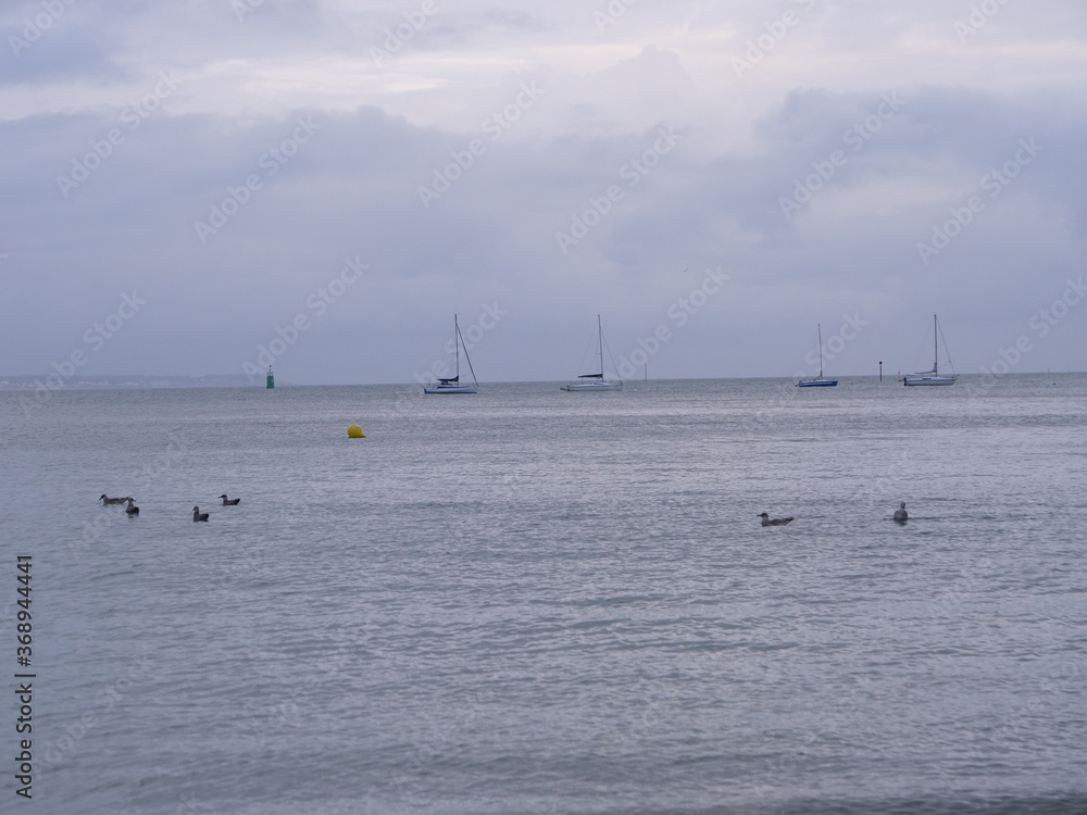 A view on the bay of la Baule, from le Pouligue. The picture was taken in summer during a cloudy day. july 2020 A view on the bay of la Baule, from le Pouligue. The picture was taken in summer during a cloudy day. july 2020