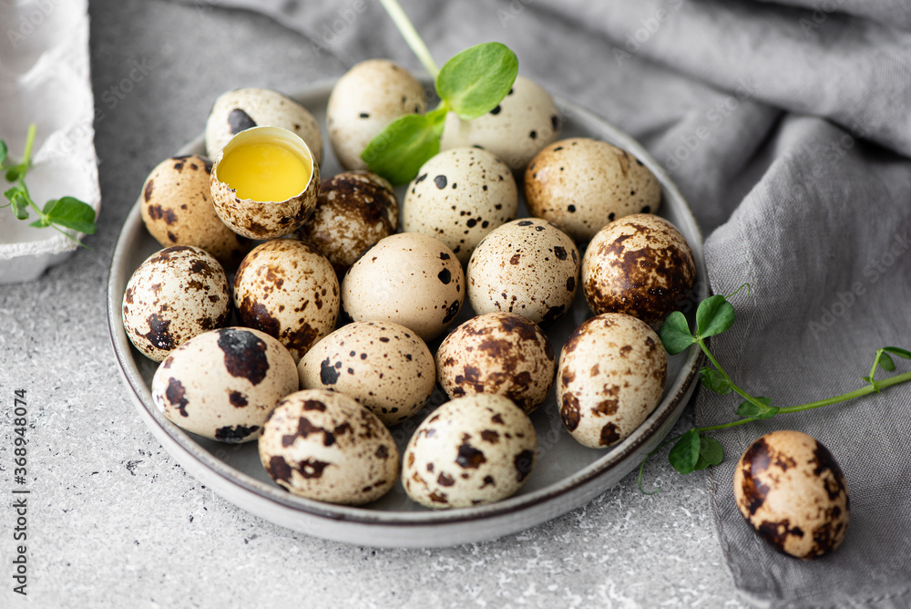 fresh quail eggs and one broken quail egg fresh quail eggs and one broken quail egg