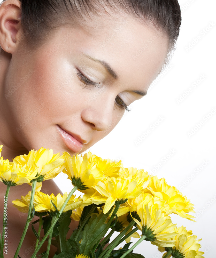 female face with the yellow chrysanthemum female face with the yellow chrysanthemum