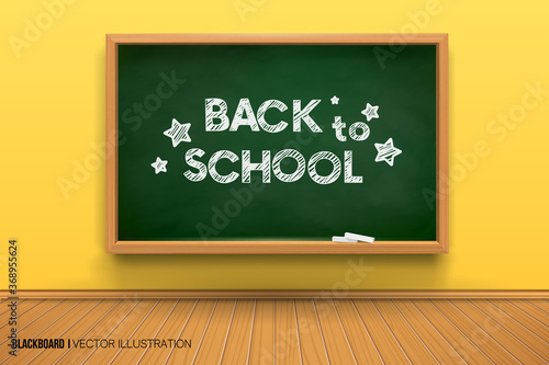 Room with a blackboard on the wall,writing desk.3D board.Chalk inscription on a blackboard. Back to school. Realistic black board in a wooden frame.Empty room with a yellow wall and wooden floor.