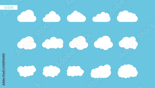 Set of clouds in flat design. Isolated bubble cloud icons. Fluffy cloudy sky. Modern simple style of forecast icons. White clouds on blue background. EPS 10.