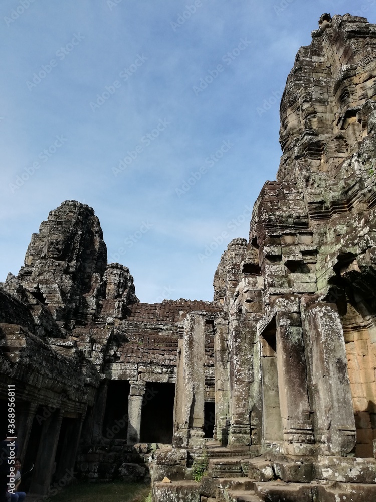 The tranquil stone faces of Bayon.  