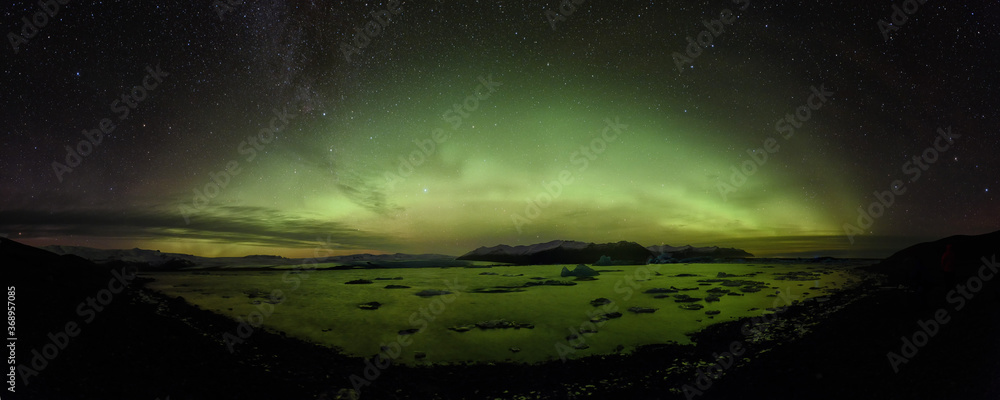 northern lights aurora in Jokulsarlon glacial river lagoon